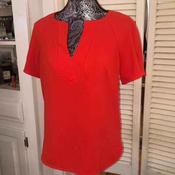 Trina Turk VNeck Polyester Blouse in Deep Coral Red. Made in USA. - Picture 1 of 12